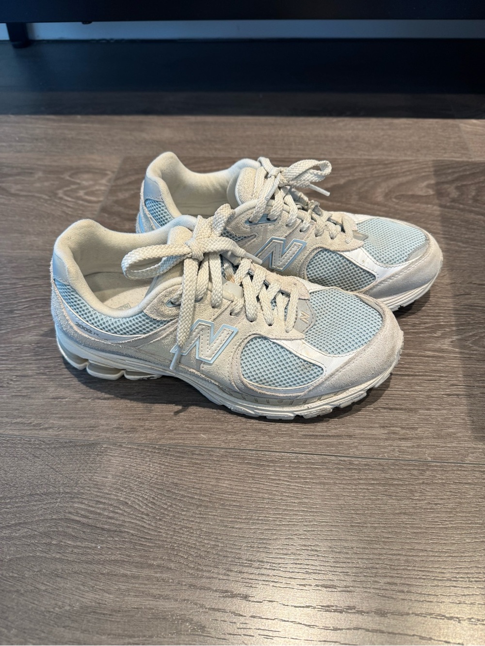 New Balance Women's White leather with Pale Blue Mesh Lace-Up Sneakers